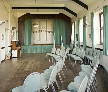 Spacious hall with permanent stage