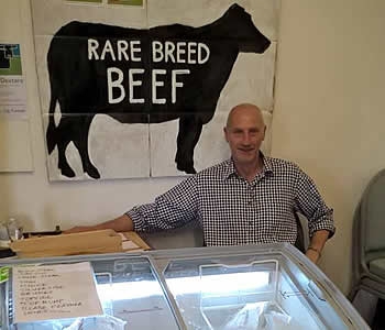 Stall holder at the local produce market